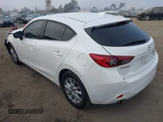 2014 Mazda Mazda3 i Touring with VIN JM1BM1L7XE1113628, listed as a IAAI auction lot 41218193 with 166,469 mi miles. Bid and sale history available at carsss.com. Image 3.