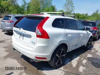 2014 Volvo XC60 R-Design Premier Plus with VIN YV4902DZ0E2546642, listed as a IAAI auction lot 42149824 with 133,669 mi miles and . Bid and sale history available at DreamBid. Image 4.