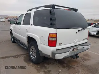 2002 Chevrolet Tahoe Z71 with VIN 1GNEK13Z22R303223, listed as a IAAI auction lot 41527148 with 211,835 mi miles. Bid and sale history available at carsss.com. Image 3.
