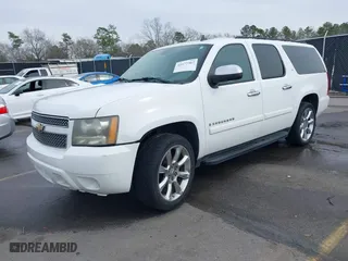 2008 Chevrolet Suburban LTZ with VIN 1GNFC16018R143195, listed as a IAAI auction lot 41577367 with 223,506 mi miles. Bid and sale history available at carsss.com. Image 17.