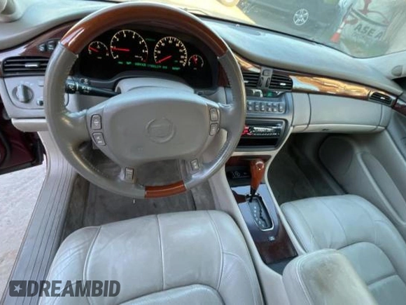 2002 Cadillac DeVille DTS with VIN 1G6KF57912U135771, listed as a Copart auction lot 82052554 with 56,268 mi miles and Clean Title. Bid and sale history available at carsss.com. Image 9.