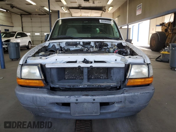 2000 Ford Ranger XL with VIN 1FTYR10C2YPB63860, listed as a Copart auction lot 65560005 with 124,721 mi miles and Clean title. Bid and sale history available at DreamBid. Image 5.