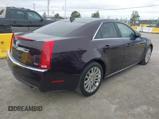 2010 Cadillac CTS Premium with VIN 1G6DP5EV4A0116188, listed as a IAAI auction lot 42808158 with 125,359 mi miles and . Bid and sale history available at DreamBid. Image 4.