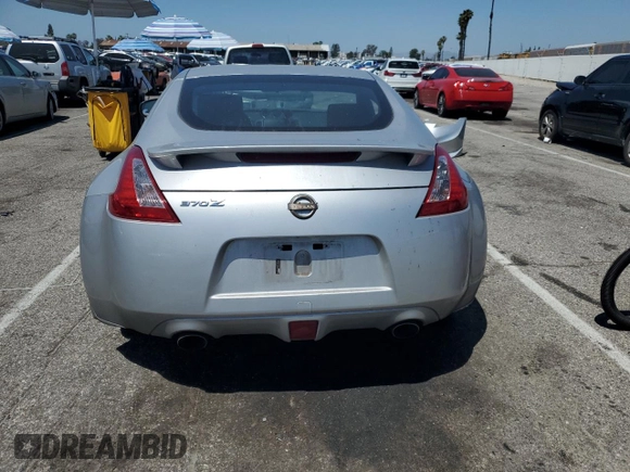 2014 Nissan 370Z Nismo with VIN JN1AZ4EH8EM633218, listed as a Copart auction lot 57296165 with Not provided miles and Salvage title. Bid and sale history available at DreamBid. Image 6.