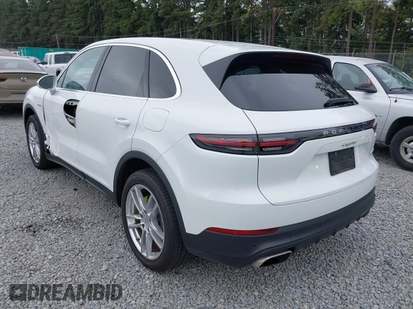 2019 Porsche Cayenne E-Hybrid z VIN WP1AE2AY0KDA52065, wystawiony jako IAAI lot #42687097 z przebiegiem 53 670 mil mil oraz . Historia ofert i sprzedaży dostępna na DreamBid. Obrazek 3.