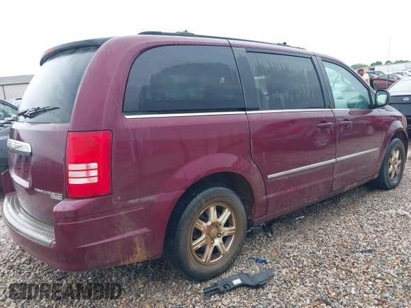 2009 Chrysler Town & Country Touring with VIN 2A8HR54169R618640, listed as a IAAI auction lot 42210905 with 227,420 mi miles and . Bid and sale history available at DreamBid. Image 4.