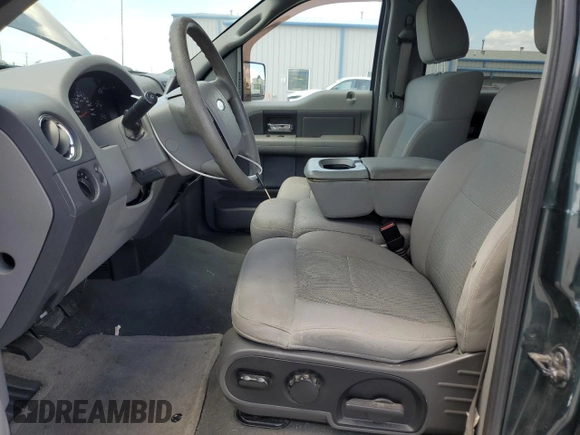 2005 Ford F-150 XLT with VIN 1FTRW12W05KC77725, listed as a Copart auction lot 61828205 with 171,121 mi miles and Salvage title. Bid and sale history available at DreamBid. Image 7.