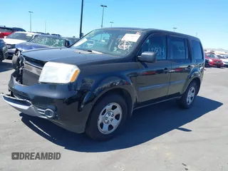 2015 Honda Pilot LX with VIN 5FNYF3H25FB016469, listed as a IAAI auction lot 41760874 with 188,837 mi miles and . Bid and sale history available at carsss.com. Image 2.