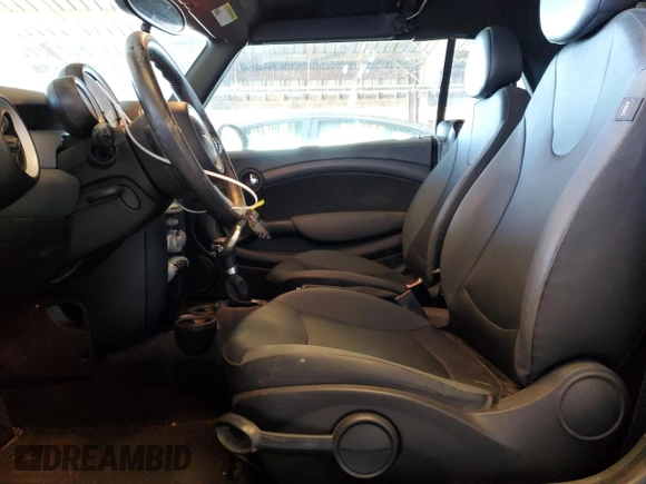 2010 MINI Convertible with VIN WMWMR3C59ATU98390, listed as a Copart auction lot 88820365 with 93,029 mi miles and Clean Title. Bid and sale history available at DreamBid. Image 7.