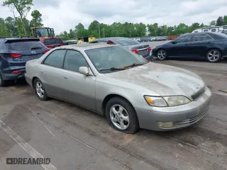 1998 Lexus ES 300 Luxury Sport Sdn with VIN JT8BF28G2W5023651, listed as a IAAI auction lot 42106837 with 245,107 mi miles. Bid and sale history available at carsss.com. Image 1.