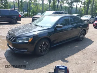 2014 Volkswagen Passat Wolfsburg Edition with VIN 1VWAT7A35EC056127, listed as a IAAI auction lot 42497467 with 111,443 mi miles and . Bid and sale history available at DreamBid. Image 2.
