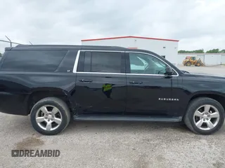 2016 Chevrolet Suburban LT with VIN 1GNSKHKC4GR233059, listed as a IAAI auction lot 42137869 with 115,571 mi miles. Bid and sale history available at carsss.com. Image 13.