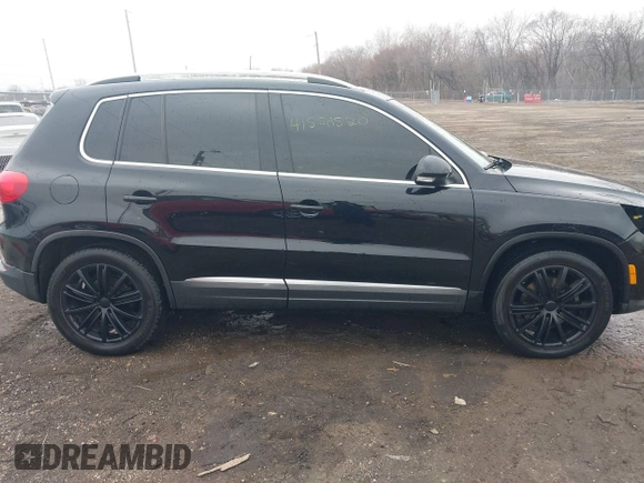 2012 Volkswagen Tiguan SE with VIN WVGAV7AX0CW602713, listed as a IAAI auction lot 41558520 with 95,678 mi miles and . Bid and sale history available at DreamBid. Image 13.