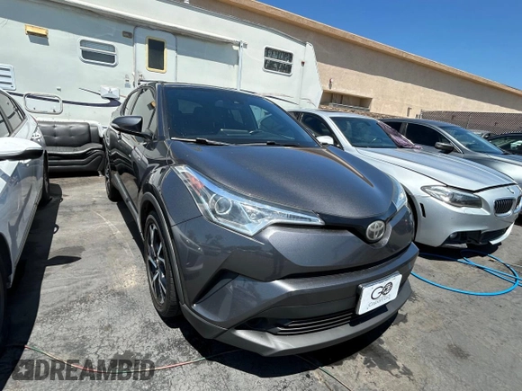 2018 Toyota C-HR XLE with VIN NMTKHMBX1JR004008, listed as a Copart auction lot 61504265 with 106,802 mi miles and Clean title. Bid and sale history available at DreamBid. Image 1.