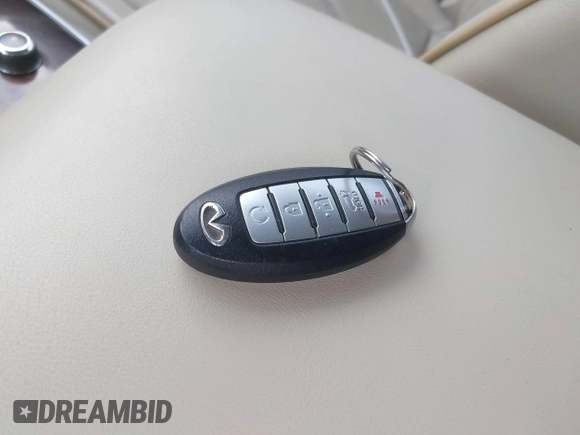 2015 Infiniti QX60 with VIN 5N1AL0MM8FC523309, listed as a IAAI auction lot 42117242 with Not Provided miles and . Bid and sale history available at DreamBid. Image 11.