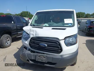 2018 Ford Transit with VIN 1FTYE1ZM0JKA43498, listed as a IAAI auction lot 42514847 with 131,539 mi miles and . Bid and sale history available at DreamBid. Image 12.