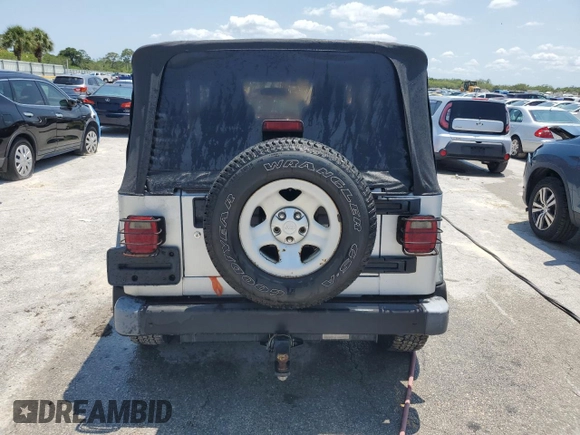 2004 Jeep Wrangler X with VIN 1J4FA39S74P763492, listed as a Copart auction lot 54664095 with 168,493 mi miles and Salvage Title. Bid and sale history available at DreamBid. Image 6.
