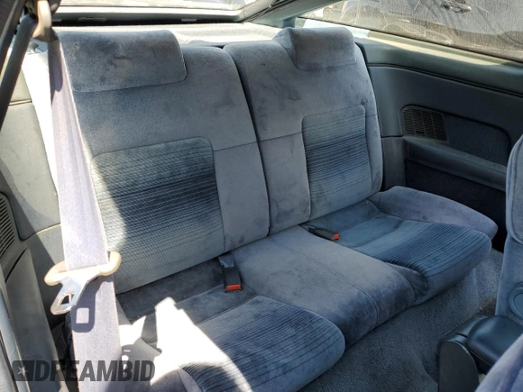 1989 Ford Probe z VIN 1ZVBT21C9K5202343, wystawiony jako Copart lot #55885985 z przebiegiem 150 457 mil mil oraz Czysty tytuł • Clean title. Historia ofert i sprzedaży dostępna na DreamBid. Obrazek 10.