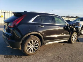 2020 Cadillac XT4 FWD Premium Luxury z VIN 1GYFZCR44LF056476, wystawiony jako Copart lot #43559495 z przebiegiem 51 076 mil mil oraz Szkody całkowita. Historia ofert i sprzedaży dostępna na DreamBid. Obrazek 3.
