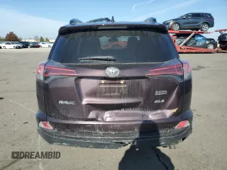 2018 Toyota RAV4 XLE with VIN 2T3WFREVXJW461897, listed as a Copart auction lot 48459355 with 159,479 mi miles and Salvage Title. Bid and sale history available at DreamBid. Image 6.