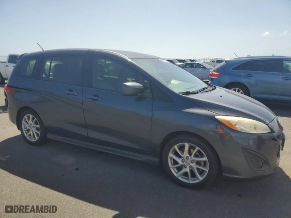 2012 Mazda Mazda5 Touring with VIN JM1CW2CL9C0107033, listed as a Copart auction lot 48832575 with 133,871 mi miles and Clean Title. Bid and sale history available at carsss.com. Image 4.