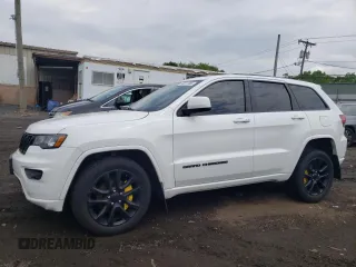 2018 Jeep Grand Cherokee Altitude with VIN 1C4RJFAG8JC445895, listed as a Copart auction lot 58811565 with 76,064 mi miles and Salvage title. Bid and sale history available at DreamBid. Image 1.