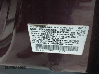 2011 Honda Pilot EX-L with VIN 5FNYF3H61BB050776, listed as a IAAI auction lot 41934621 with 172,424 mi miles and . Bid and sale history available at DreamBid. Image 9.