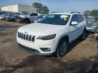 2019 Jeep Cherokee Latitude Plus z VIN 1C4PJLLBXKD308346, wystawiony jako IAAI lot #42146125 z przebiegiem 94 066 mil mil oraz . Historia ofert i sprzedaży dostępna na DreamBid. Obrazek 2.