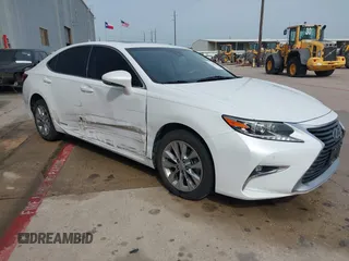 2016 Lexus ES 300h z VIN JTHBW1GGXG2122104, wystawiony jako IAAI lot #42242971 z przebiegiem 148 570 mil mil oraz . Historia ofert i sprzedaży dostępna na DreamBid. Obrazek 1.