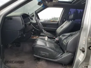 2003 Nissan Pathfinder LE z VIN JN8DR09Y73W801482, wystawiony jako Copart lot #56216005 z przebiegiem 238 781 mil mil oraz Szkoda całkowita • Salvage title. Historia ofert i sprzedaży dostępna na DreamBid. Obrazek 7.