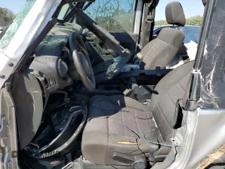 2012 Jeep Wrangler Sport с VIN 1C4AJWAG3CL232403, выставлен на аукционе Copart как лот 48869505 с пробегом Не указан миль и Списание • Salvage title. История ставок и продаж доступна на DreamBid. Изображение 7.