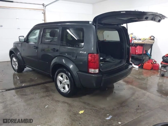2010 Dodge Nitro SXT with VIN 1D4PU5GK0AW126478, listed as a IAAI auction lot 41362674 with 171,704 mi miles. Bid and sale history available at carsss.com. Image 3.