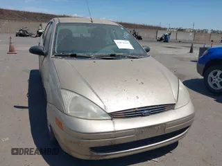 2000 Ford Focus LX with VIN 1FAFP33P2YW427999, listed as a IAAI auction lot 42874144 with 121,885 mi miles and . Bid and sale history available at DreamBid. Image 6.