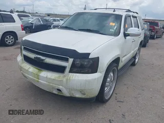 2009 Chevrolet Tahoe 2LT z VIN 1GNFC23059R156494, wystawiony jako IAAI lot #42423722 z przebiegiem Nie podano mil oraz . Historia ofert i sprzedaży dostępna na DreamBid. Obrazek 2.