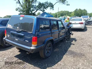 2000 Jeep Cherokee z VIN 1J4FF48S7YL120307, wystawiony jako IAAI lot #42818178 z przebiegiem 160 334 mil mil oraz . Historia ofert i sprzedaży dostępna na DreamBid. Obrazek 4.