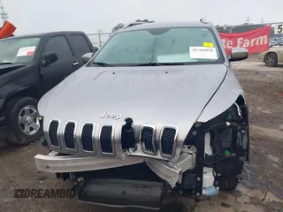 2016 Jeep Cherokee Latitude with VIN 1C4PJLCS7GW336973, listed as a IAAI auction lot 41769839 with 89,805 mi miles. Bid and sale history available at carsss.com. Image 6.