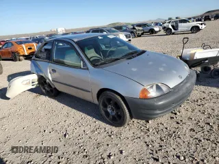 2001 Suzuki Swift GA z VIN 2S2AB21H516602339, wystawiony jako Copart lot #50135584 z przebiegiem 142 476 mil mil oraz Szkody całkowita. Historia ofert i sprzedaży dostępna na DreamBid. Obrazek 4.