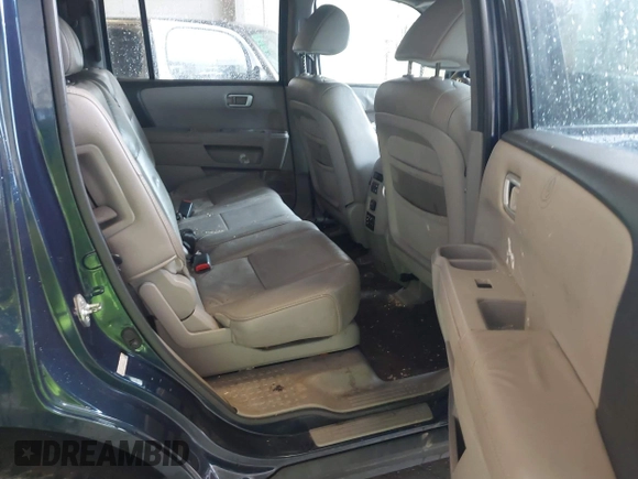 2011 Honda Pilot EX-L with VIN 5FNYF4H66BB020176, listed as a IAAI auction lot 41973659 with 238,745 mi miles and . Bid and sale history available at carsss.com. Image 8.