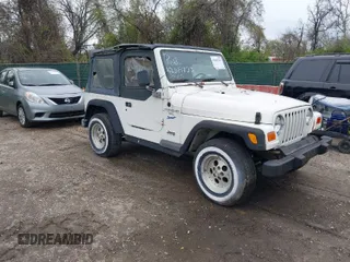 1998 Jeep Wrangler Sport with VIN 1J4FY19S0WP779147, listed as a IAAI auction lot 42045723 with 205,822 mi miles. Bid and sale history available at carsss.com. Image 1.