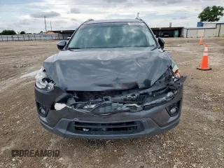 2014 Mazda CX-5 Touring z VIN JM3KE2CY7E0308580, wystawiony jako Copart lot #60565835 z przebiegiem 92 708 mil mil oraz Szkoda całkowita • Salvage title. Historia ofert i sprzedaży dostępna na DreamBid. Obrazek 5.