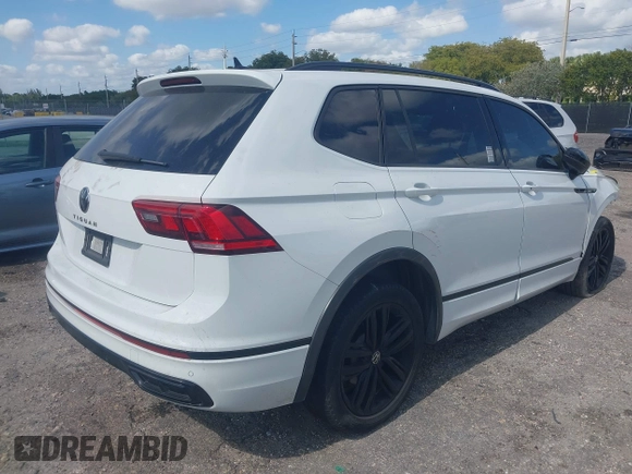 2022 Volkswagen Tiguan SE R-Line Black with VIN 3VVCB7AX5NM040222, listed as a IAAI auction lot 42073998 with 36,225 mi miles and . Bid and sale history available at DreamBid. Image 4.
