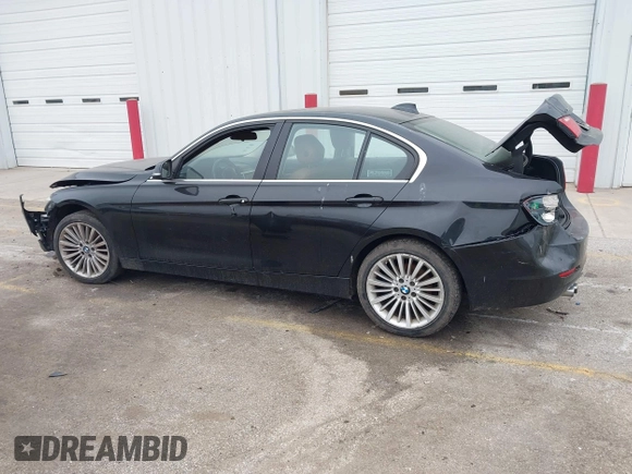 2014 BMW 3 Series 328i xDrive with VIN WBA3B5G56ENS06534, listed as a IAAI auction lot 41549553 with 165,779 mi miles and . Bid and sale history available at DreamBid. Image 14.
