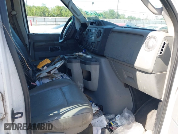2011 Ford Econoline Cargo Commercial with VIN 1FTNE1EW6BDA44784, listed as a IAAI auction lot 42028659 with 141,661 mi miles and . Bid and sale history available at carsss.com. Image 5.