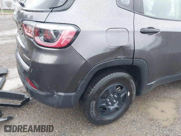 2020 Jeep Compass Sport z VIN 3C4NJCAB4LT253026, wystawiony jako IAAI lot #41897839 z przebiegiem 128 112 mil mil oraz . Historia ofert i sprzedaży dostępna na DreamBid. Obrazek 18.