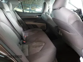 2019 Toyota Camry LE with VIN 4T1B11HK3KU290548, listed as a Copart auction lot 48233685 with 105,700 mi miles and Salvage Title. Bid and sale history available at carsss.com. Image 10.