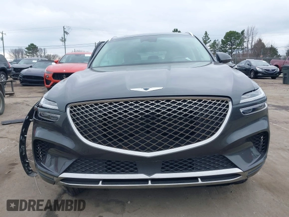 2022 Genesis GV70 2.5T with VIN KMUMADTB2NU059678, listed as a IAAI auction lot 41479833 with 30,598 mi miles and . Bid and sale history available at DreamBid. Image 12.