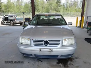 2000 Volkswagen Jetta GLS z VIN 3VWSA29M4YM195775, wystawiony jako IAAI lot #42131518 z przebiegiem 314 472 mil mil oraz . Historia ofert i sprzedaży dostępna na DreamBid. Obrazek 13.