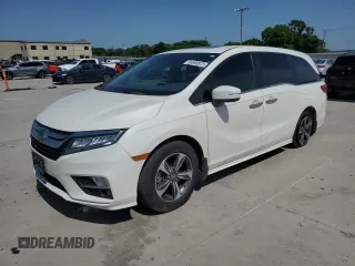 2019 Honda Odyssey Touring with VIN 5FNRL6H86KB089055, listed as a Copart auction lot 56980975 with 154,842 mi miles and Salvage title. Bid and sale history available at DreamBid. Image 1.