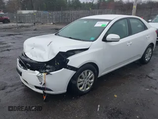 2012 Kia Forte EX with VIN KNAFU4A25C5470311, listed as a IAAI auction lot 41964569 with 146,551 mi miles. Bid and sale history available at carsss.com. Image 2.