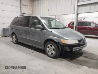 2000 Honda Odyssey EX z VIN 2HKRL1864YH618353, wystawiony jako IAAI lot #42311225 z przebiegiem 218 177 mil mil oraz . Historia ofert i sprzedaży dostępna na DreamBid. Obrazek 1.